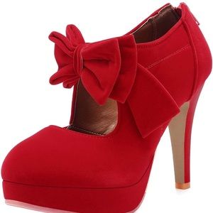 Never before worn red heels with zipper back. size 5.5, 4” heel